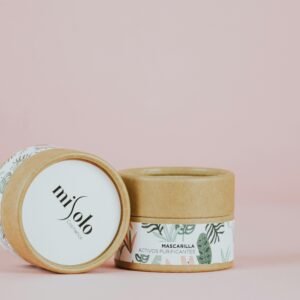 Chic skincare product packaging in eco-friendly design with pastel background.