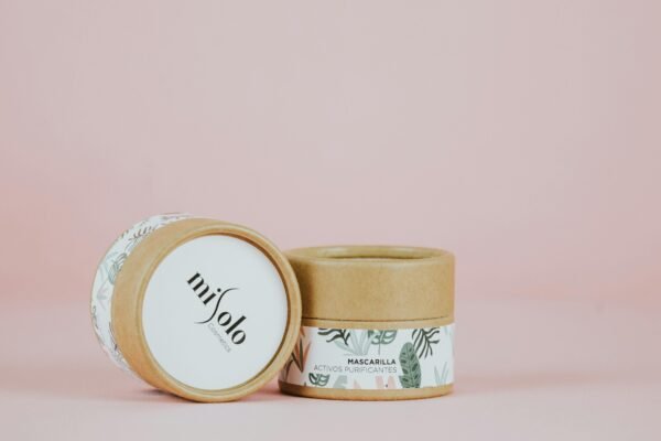 Chic skincare product packaging in eco-friendly design with pastel background.